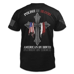 A black t-shirt with the words "Polish By Blood" with a cross holding the American and Polish flags printed on the back of the shirt.