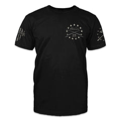 A black t-shirt with a circle of stars and two bayonets crossed over printed on the front.