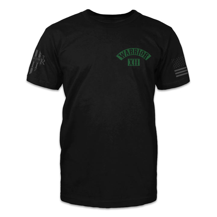 A black t-shirt with the words Warrior XII printed on the front of the shirt.