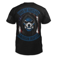 A black t-shirt with the words "Sons of Scotland - American Chapter" with a hooded Scottish skeleton with an American flag behind printed on the back of the  shirt.