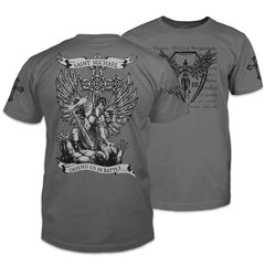 Front & back grey t-shirt with the words "Saint Michael defend us in battle" with Saint Michael Archangel in battle printed on the shirt.