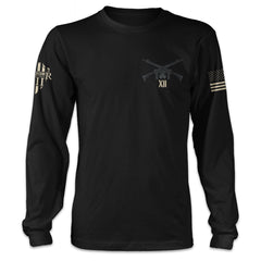 A black long sleeve shirt with two AR15's crossed over printed on the front of the shirt.