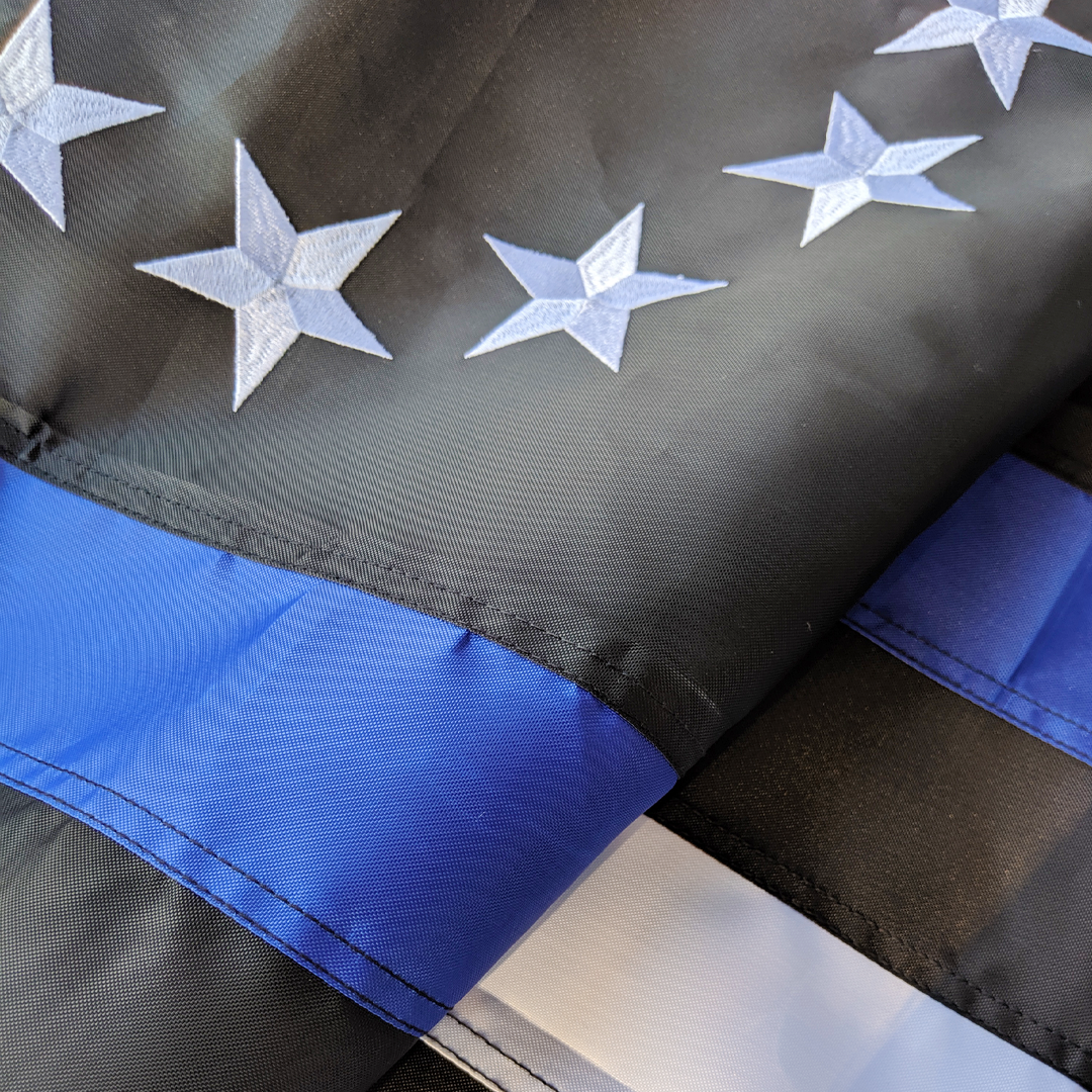 A close up of the Embroidered Thin Blue Line Betsy Ross Flag