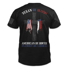 A black t-shirt with the words "Texan by blood, American by birth, patriot by choice" with the Texas and USA flag printed on the back of the shirt.