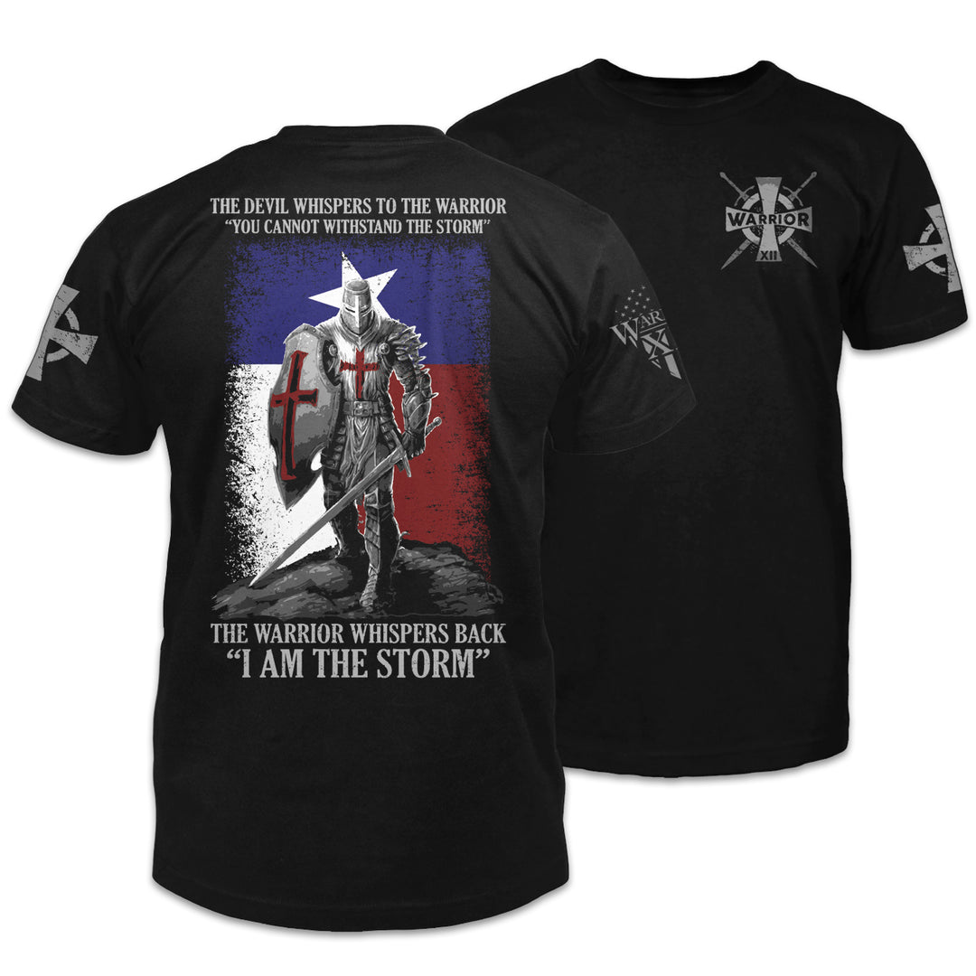 Front and back black t-shirt with the words "The Devil whispers to the Warrior, "You cannot withstand the storm." The Warrior whispers back "I am the storm." with a warrior printed on the shirt.