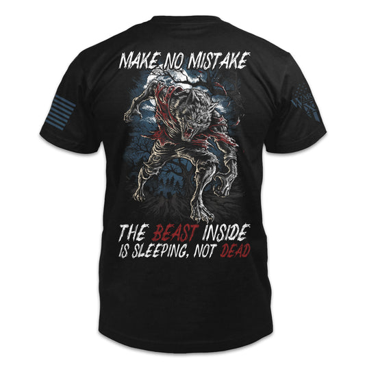 A black t-shirt with the words "Make no mistake - The beast inside is sleeping, not dead" with a beast printed on the back of the  shirt.