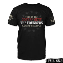 A black tall size shirt with the words "This is the government the founders warned us about" printed on the front.
