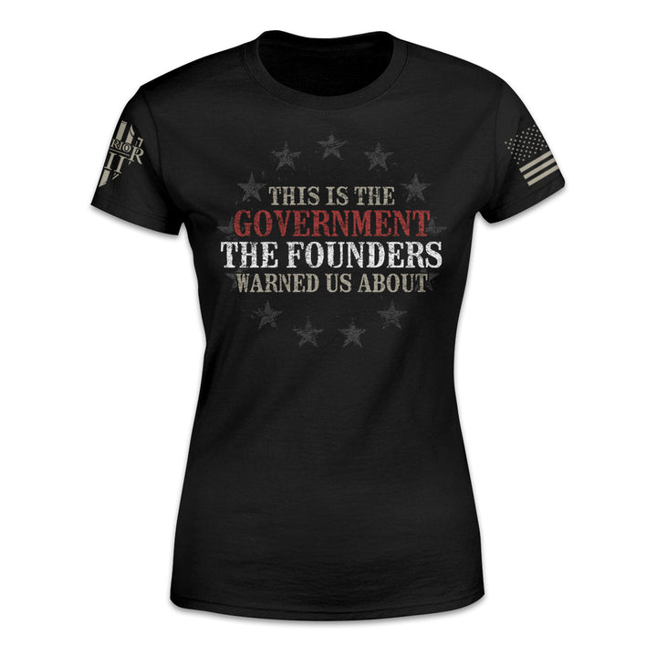 A black women's relaxed fit'shirt with the words "This is the government the founders warned us about" printed on the front.