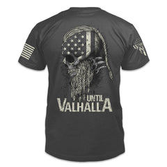 A dark grey t-shirt with the words "Until Valhalla" and a side view of a viking printed on the back of the shirt.