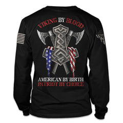 A black long sleeve shirt with the words "Viking by blood, American by birth, patriot by choice" with viking axes printed and an American flag printed on the back of the shirt.