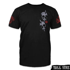 A black tall size shirt with two skulls with arrows through them printed on the front of the shirt.