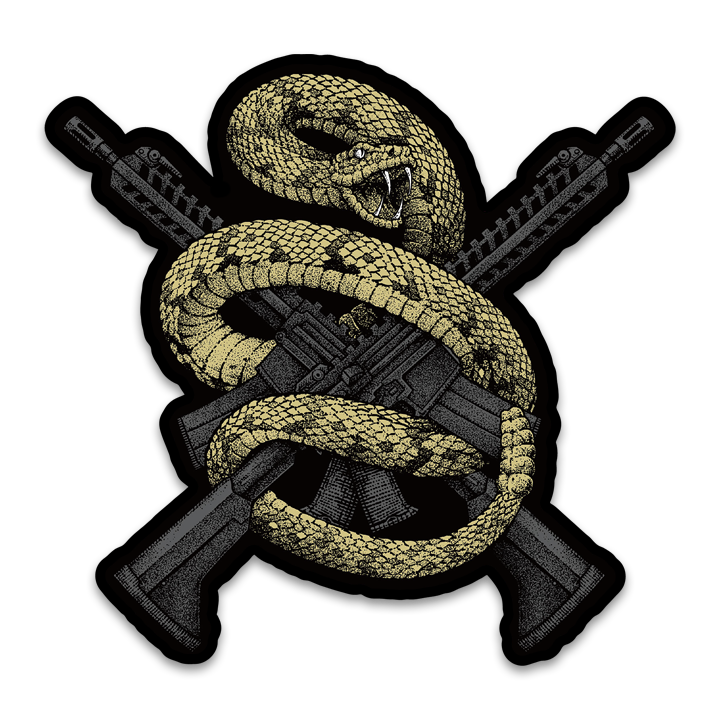 A decal with a rattlesnake wrapped around two guns.