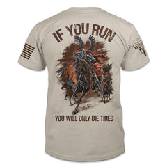 A light tan t-shirt with the words "If you run, you will only die tired" with a winged hussar printed on the back of the shirt.
